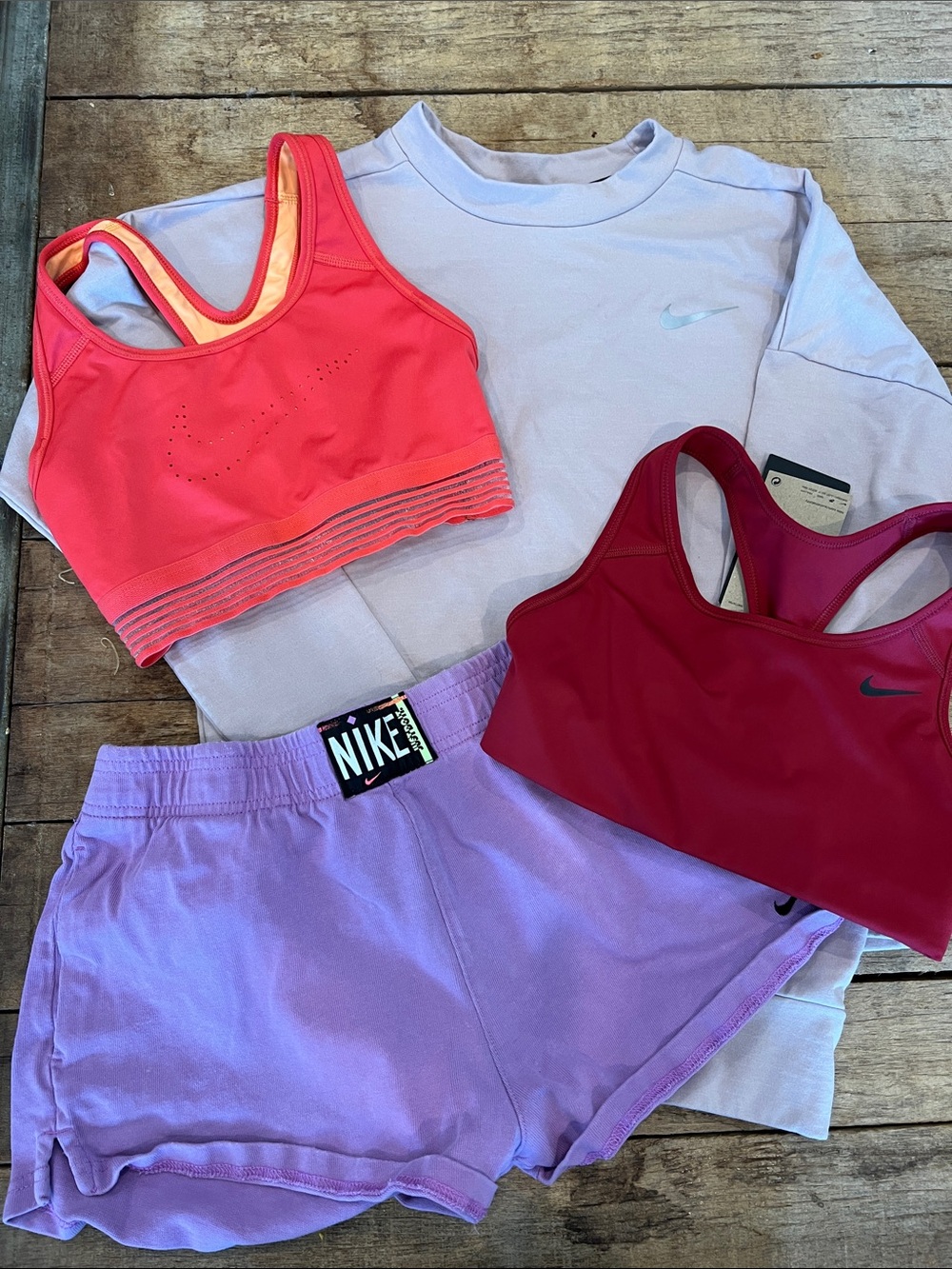 Womens Nike 4 Piece Lot, sports bras, sweater, shorts